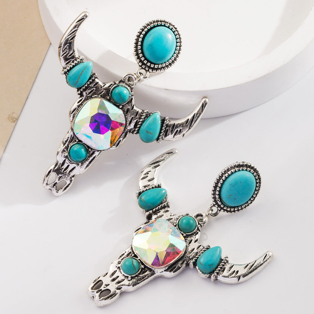 Wholesale Bohemian ethnic style turquoise milk grain leather diamond hollow earrings